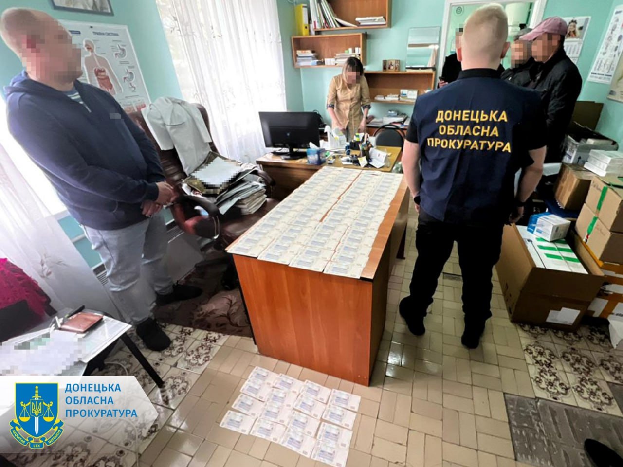 Гроші, які виявили у підозрюваного голови ВЛК у Добропіллі