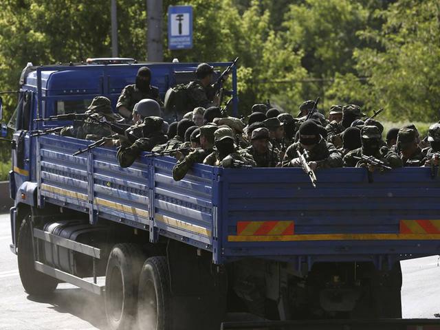 Окупанти, які прибули на імпровізований “парад” в центрі Донецька у травні 2014 року